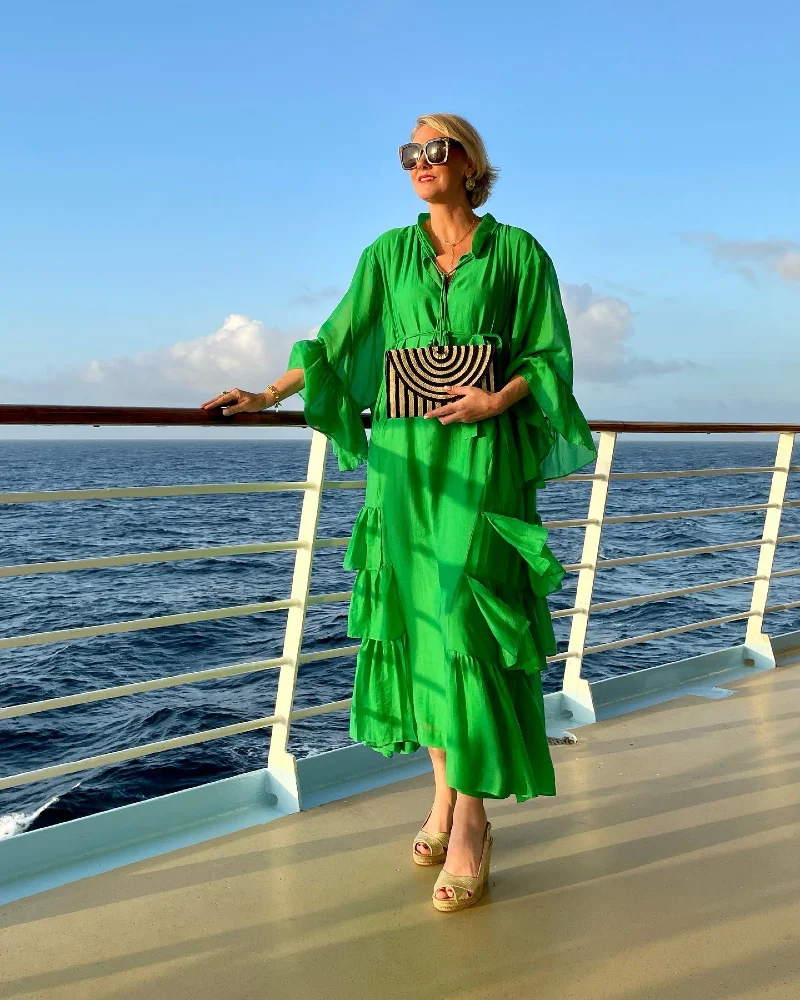 Emerald Green Tiered Maxi Dress with Geometric Striped Clutch and Wedge Sandals