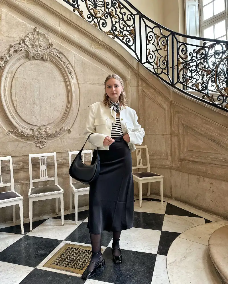 Ivory Cropped Jacket with Striped Top, Black Midi Skirt, and Patent Mary Jane Shoes