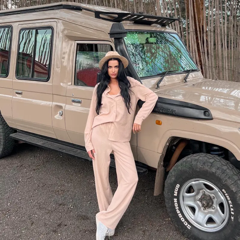 Matching Nude Button-Down Shirt and Wide-Leg Trousers with Straw Fedora