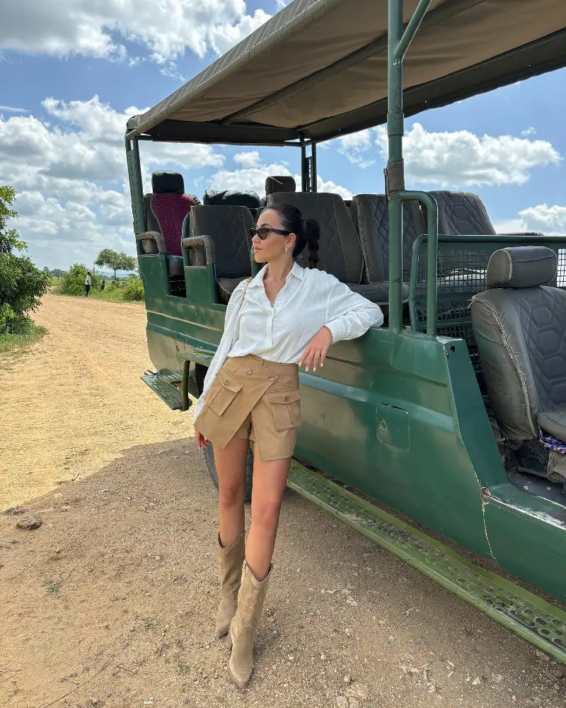 White Button-Down Shirt with Khaki Asymmetrical Cargo Shorts and Suede Boots