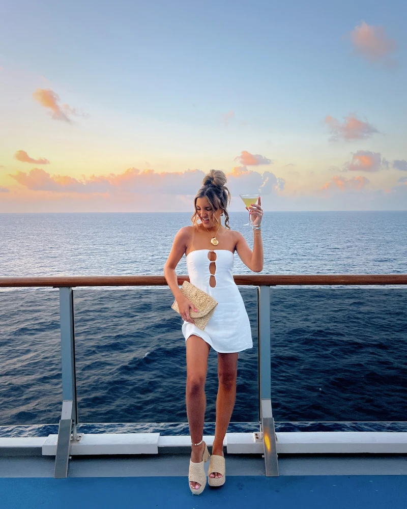 White Cutout Mini Dress with Straw Clutch and Platform Mules