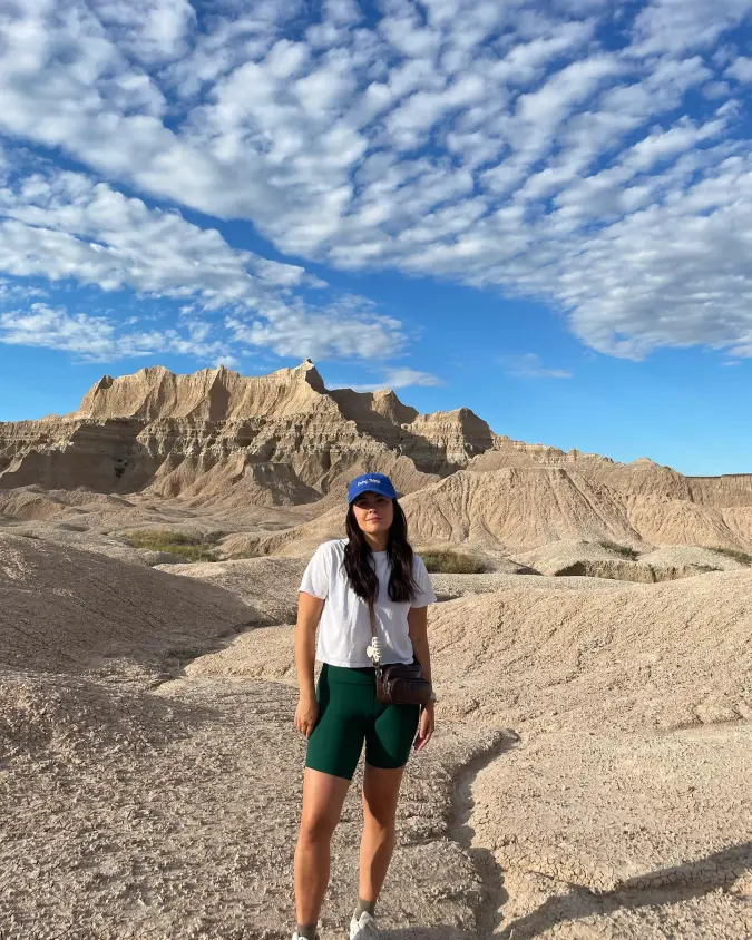 Casual Badlands Style: Classic White Tees and Athletic Shorts for Desert Treks