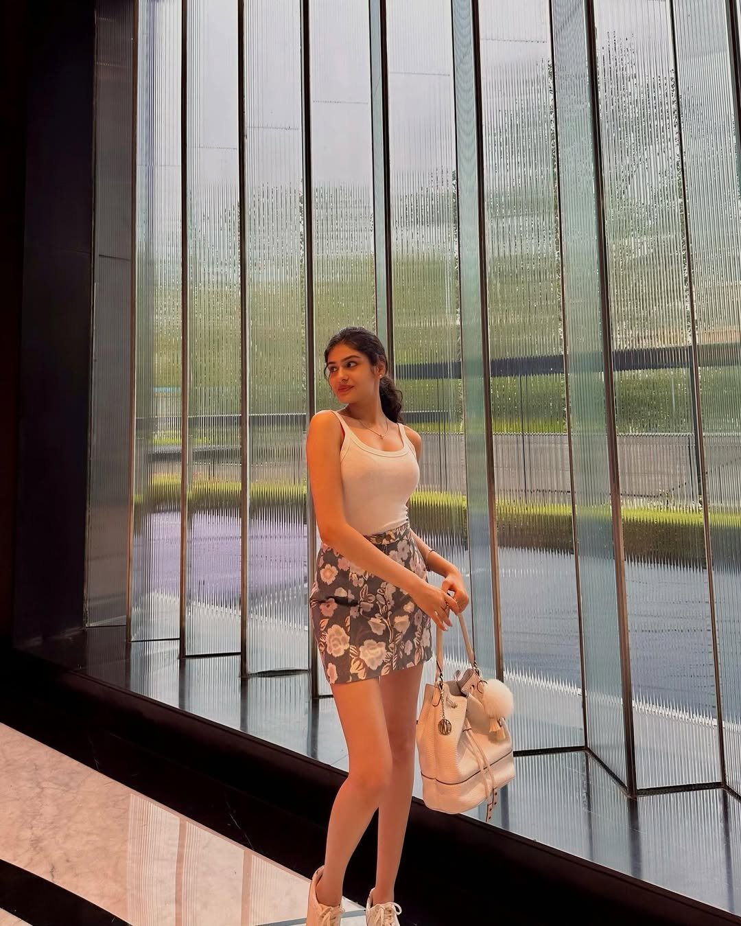 Chic White Tank & Floral Mini – A Laidback Patriotic Pick