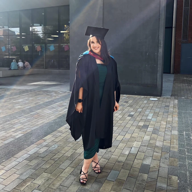  Deep Forest Green Gown: Relaxed Elegance for Graduation Moments