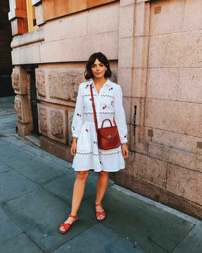 Floral White Dress and Bright Leather Accessories for Casual Weekend Elegance