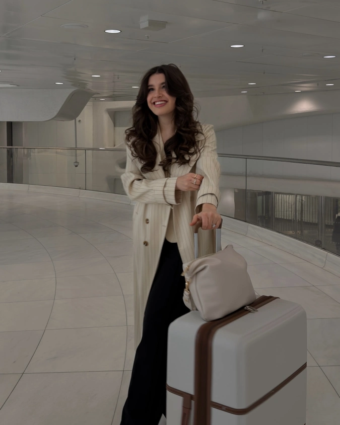 Sophisticated Pinstripe Layering: Polished Travel Ensemble