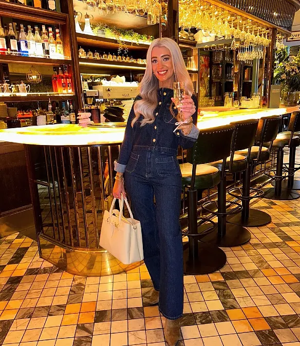 Dark Denim Jumpsuit with Gold Buttons and Cream Tote