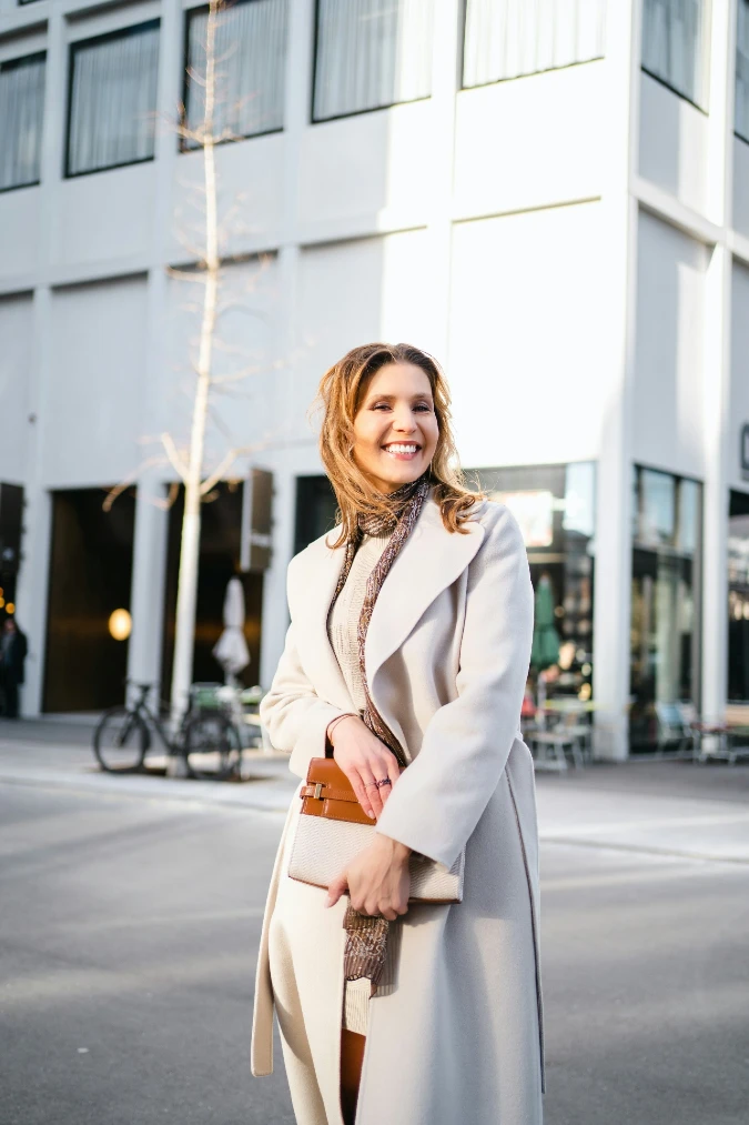 Beige Wrap Dress with White Blouse Layer and Neutral Handbag for Soft Corporate Street Style