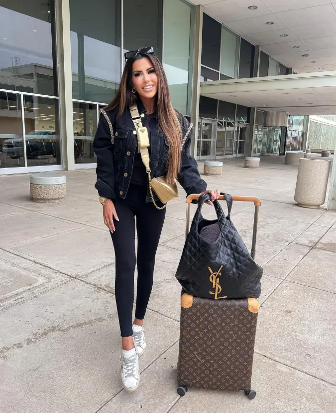 Black Denim Airport Look with Gold Travel Bags