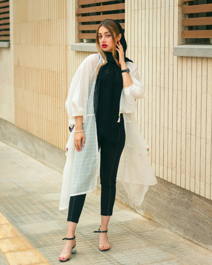 Black Tunic Top with White Sheer Overlay and Slim Black Pants for Modest City Walk Meetings
