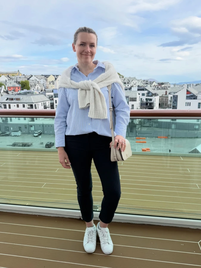 Blue Stripe Shirt with Cream Shoulder Sweater on Rooftop Deck
