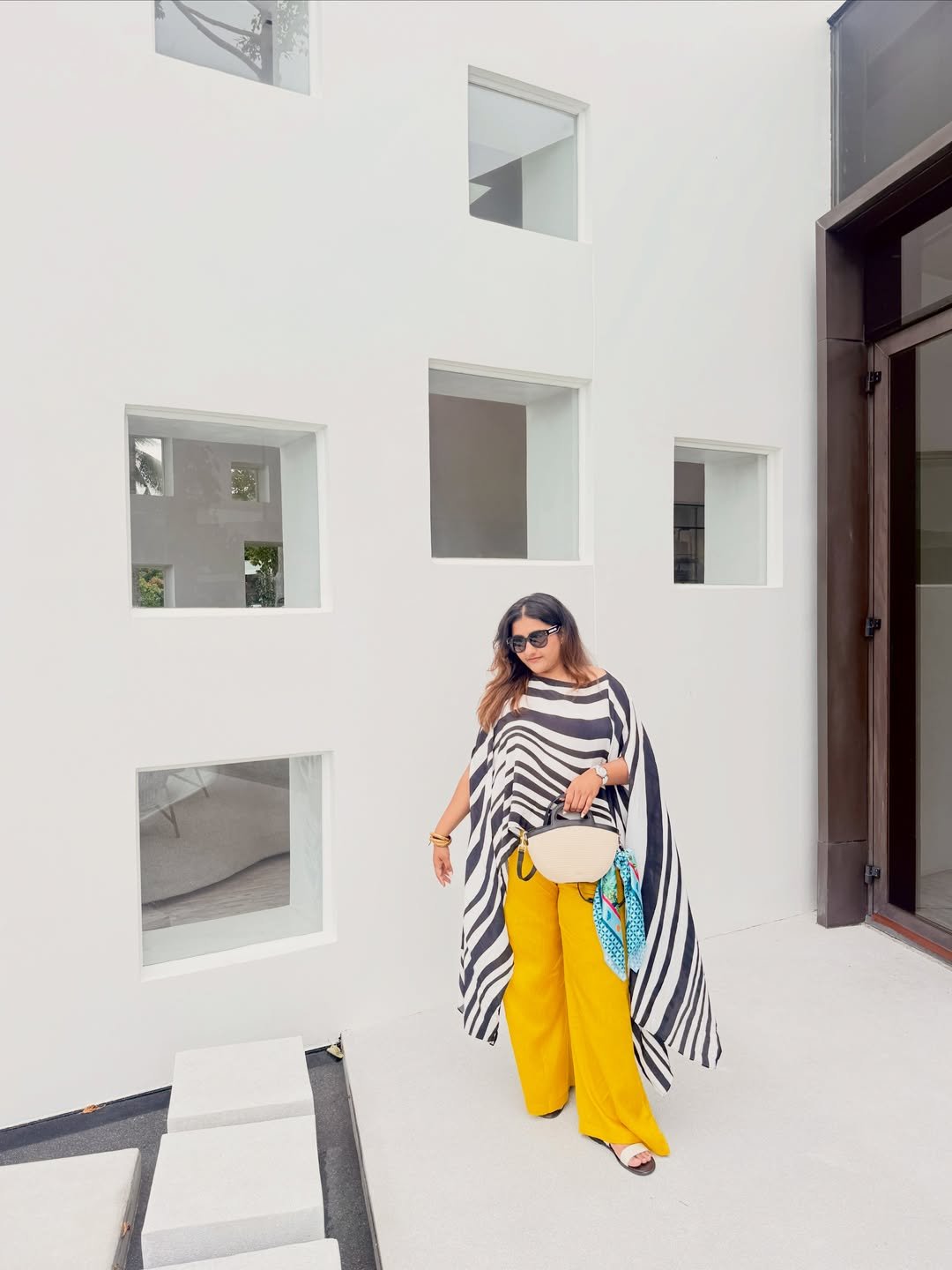 Bold Striped Poncho and Sunny Yellow Trousers