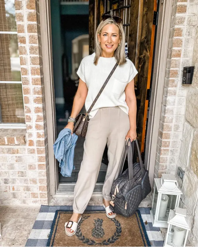 Cream Ribbed Top with Beige Joggers and Quilted Weekender Bag