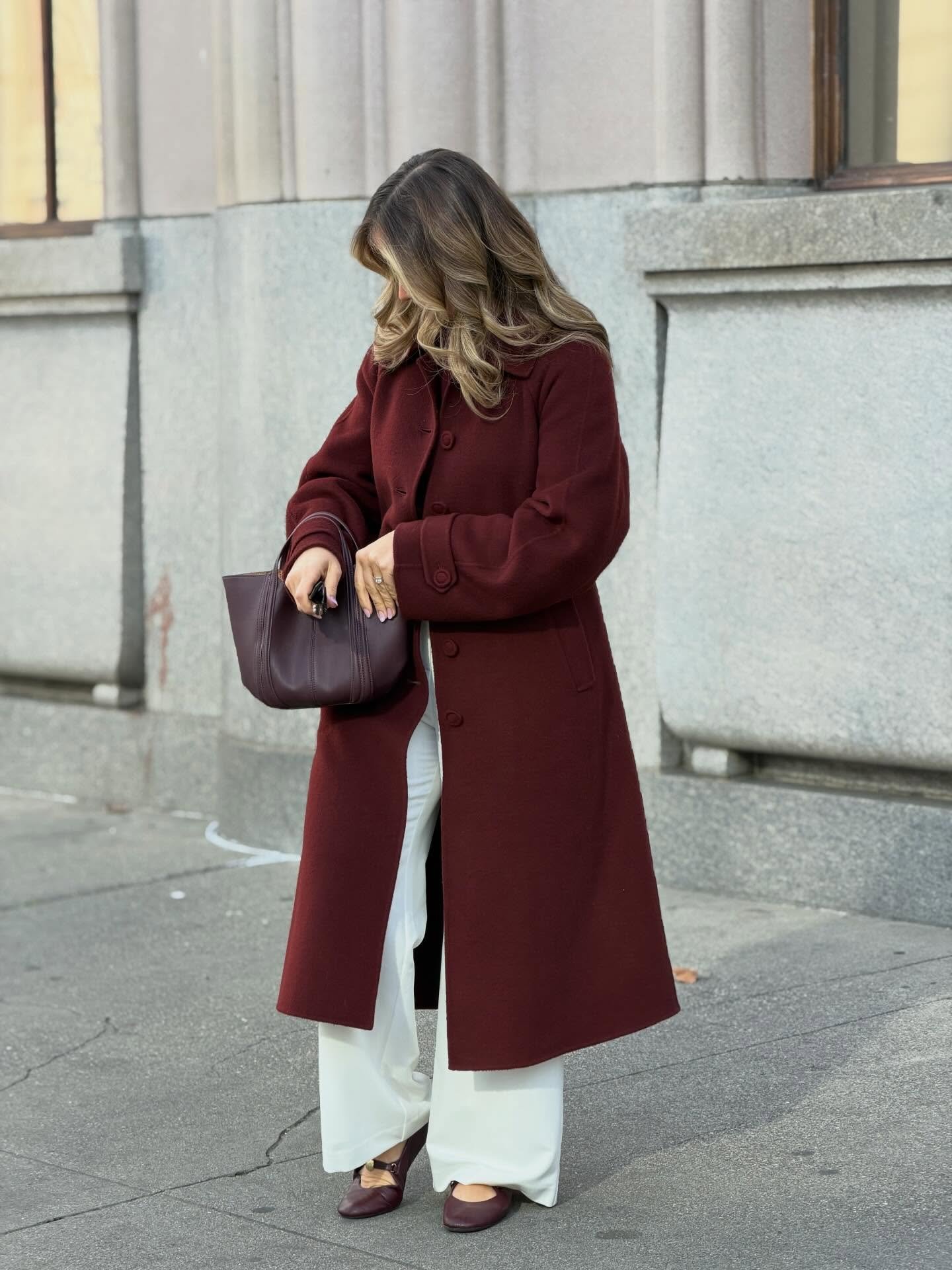 Cream Wide-Leg Trousers with Long Burgundy Wool Coat and Matching Flats