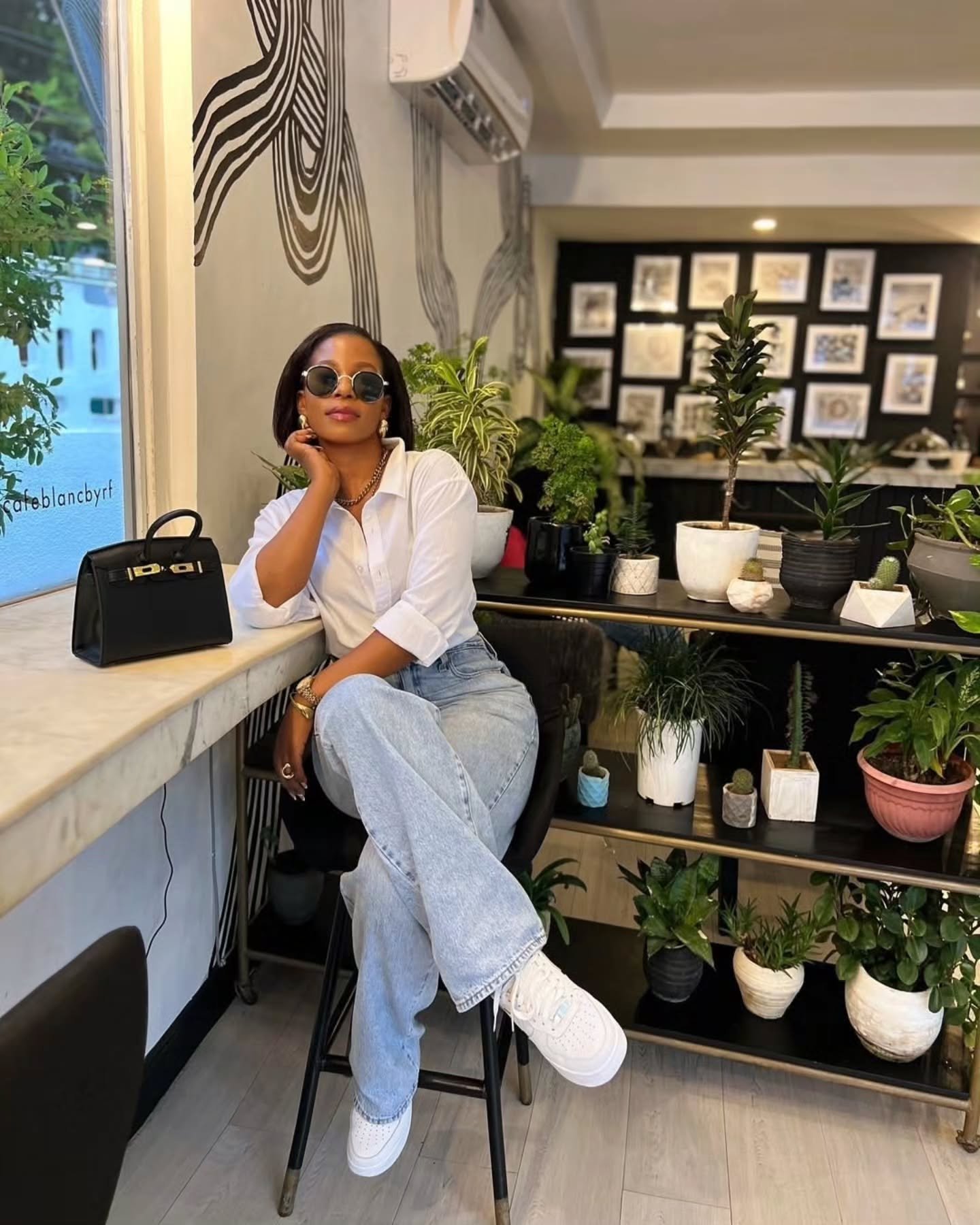 Crisp White Button-Down with Light Wash Denim and Chunky Sneakers
