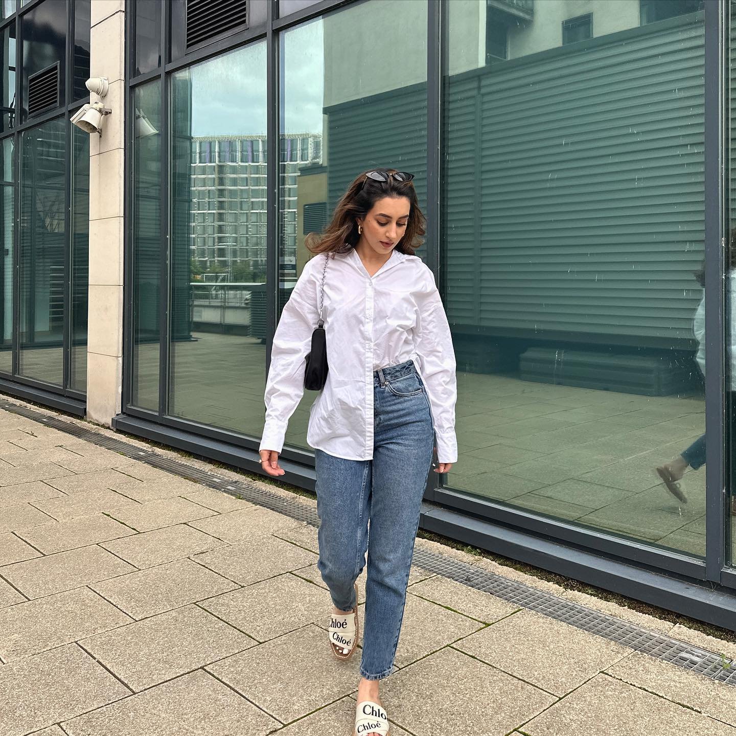 Crisp White Button-Down with Mid-Wash Tapered Denim