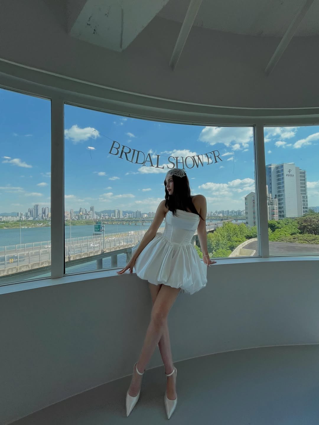 Crisp White Strapless Bubble Dress for a Modern Bridal Shower