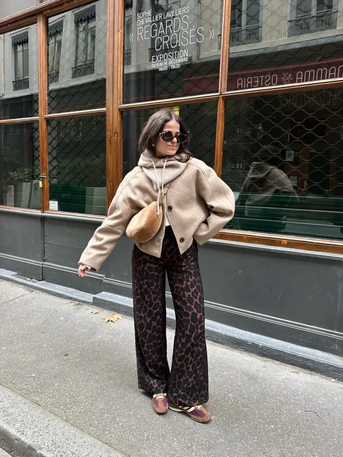Cropped Beige Jacket with Dark Leopard Trousers by Wood Framed Café Windows