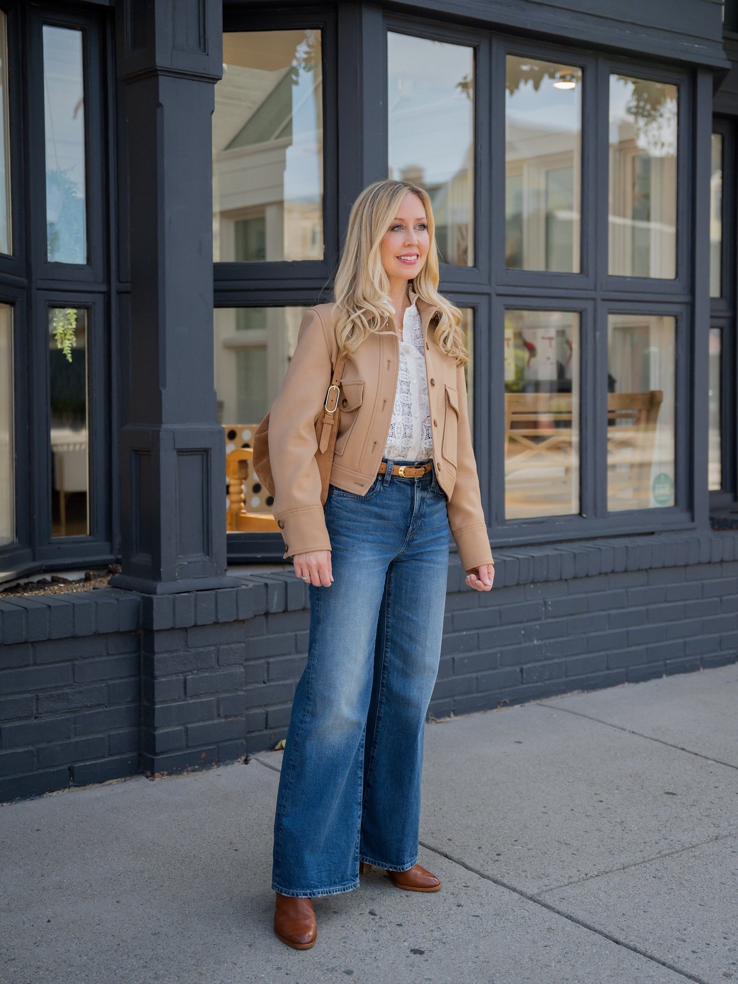 Cropped Tan Jacket with White Lace Blouse and Leather Boots