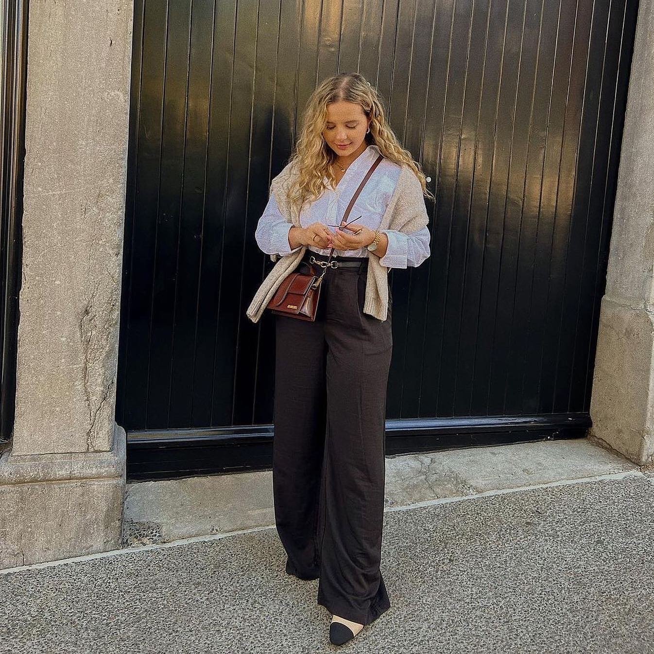 Dark Brown Trousers with Crisp White Button-Down and Tan Shoulder Knit