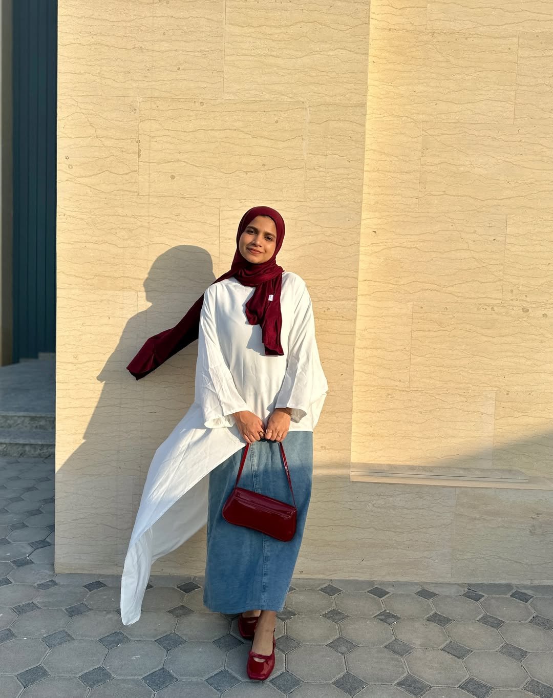 Deep Wine Accent and Asymmetrical Tunic Combo for Polished Professional Events
