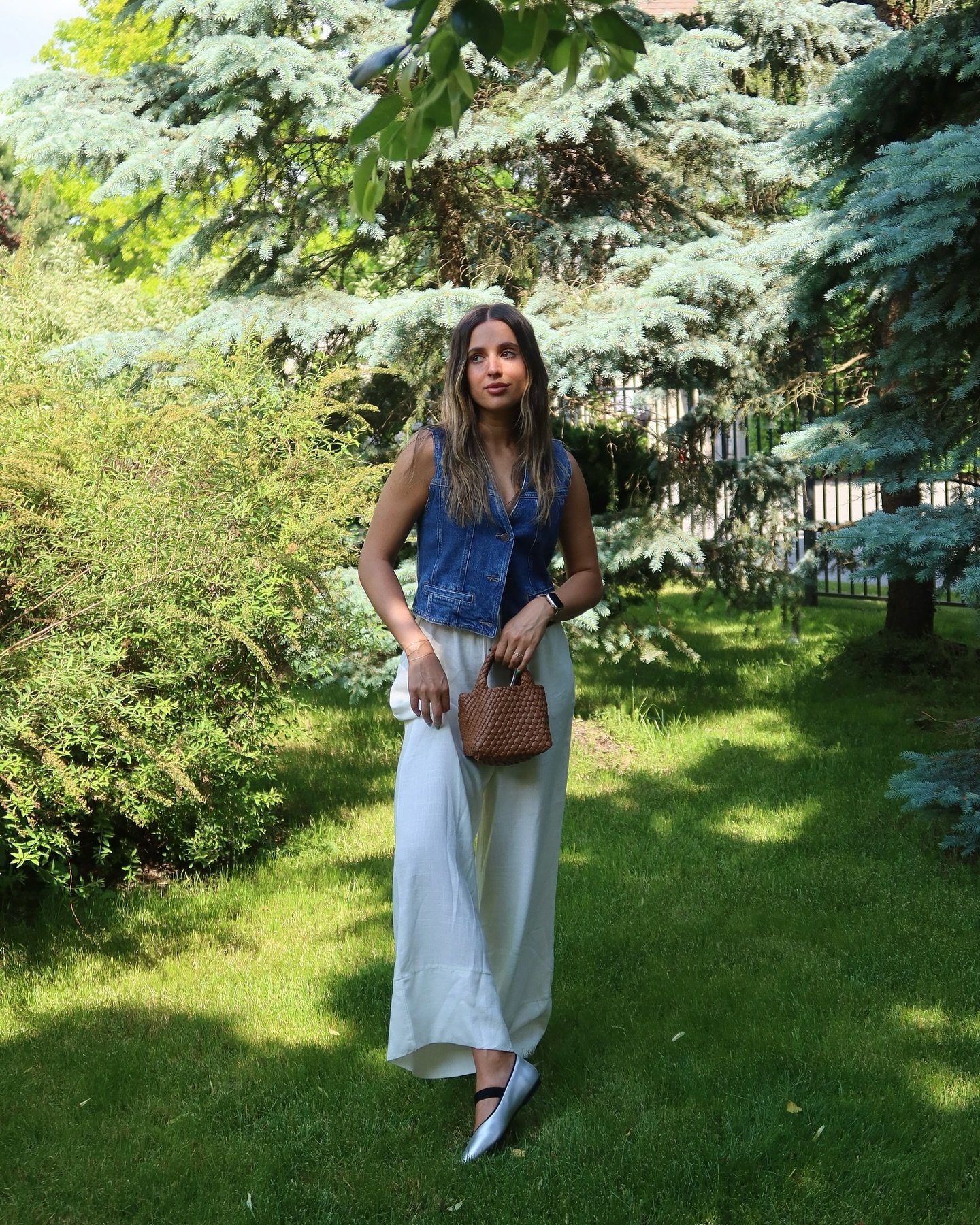 Denim Vest with White Linen Wide-Leg Trousers and Silver Ballet Flats