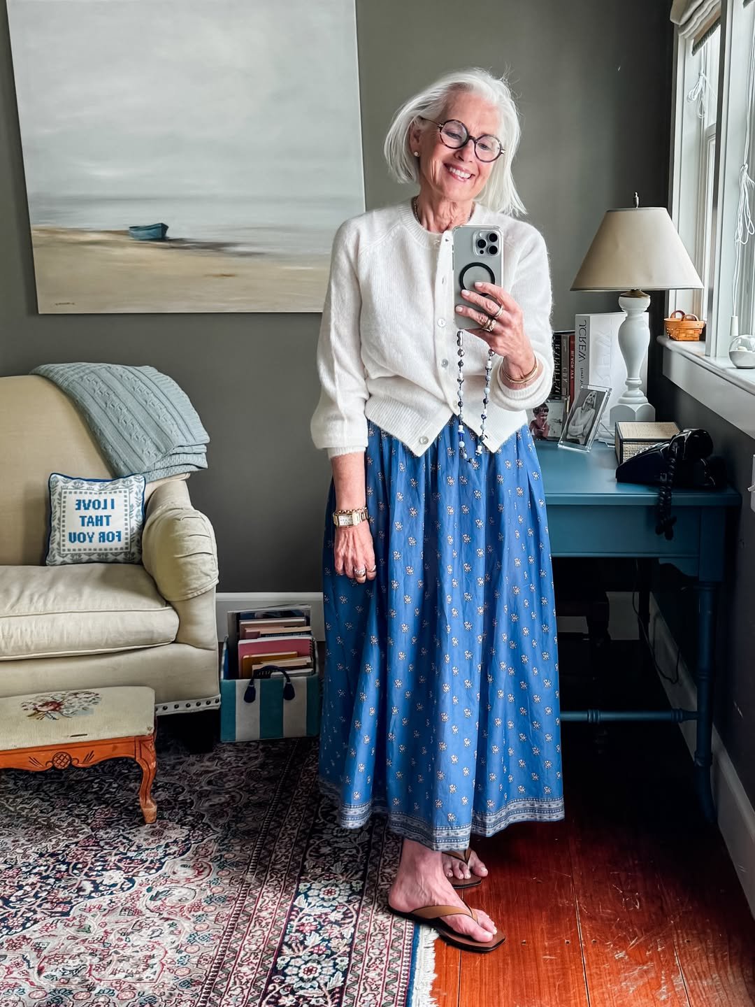 Dotted Blue Maxi Skirt with a Buttoned Cream Cardigan and Leather Flip-Flops