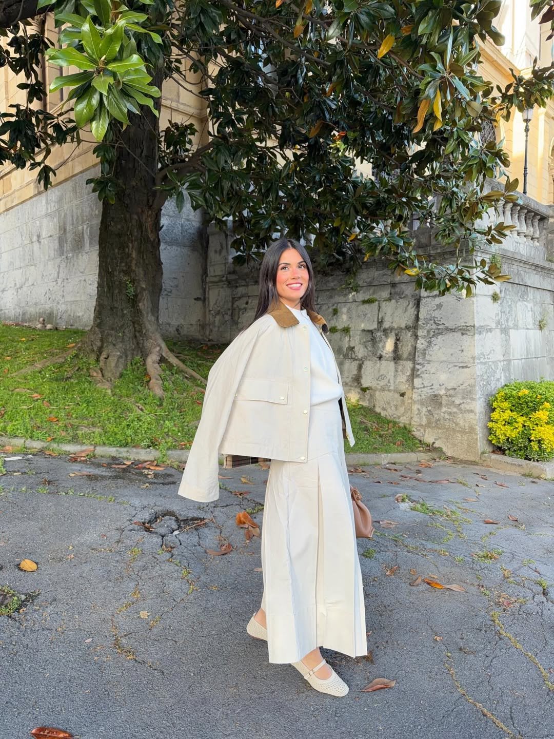 Draped Cream Canvas Jacket with Pleated Midi Skirt and Woven Flats