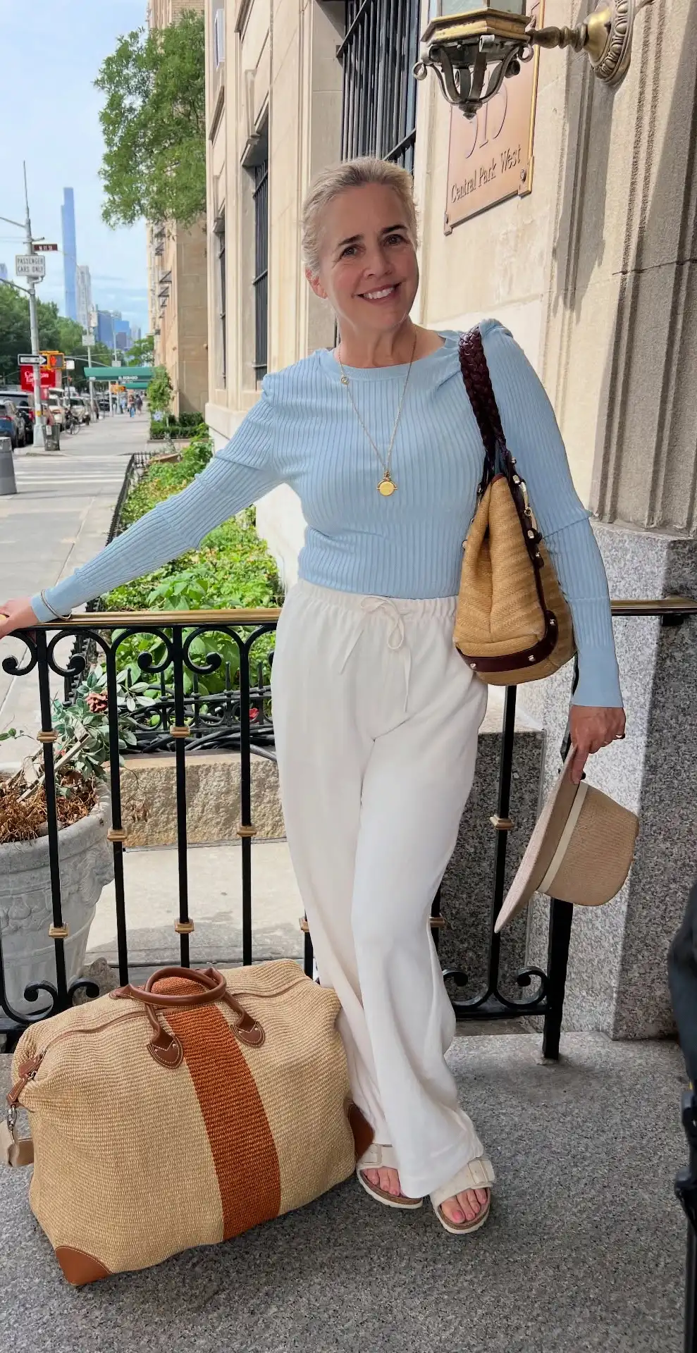 Drawstring White Trousers with Pastel Blue Ribbed Knit and Woven Travel Luggage