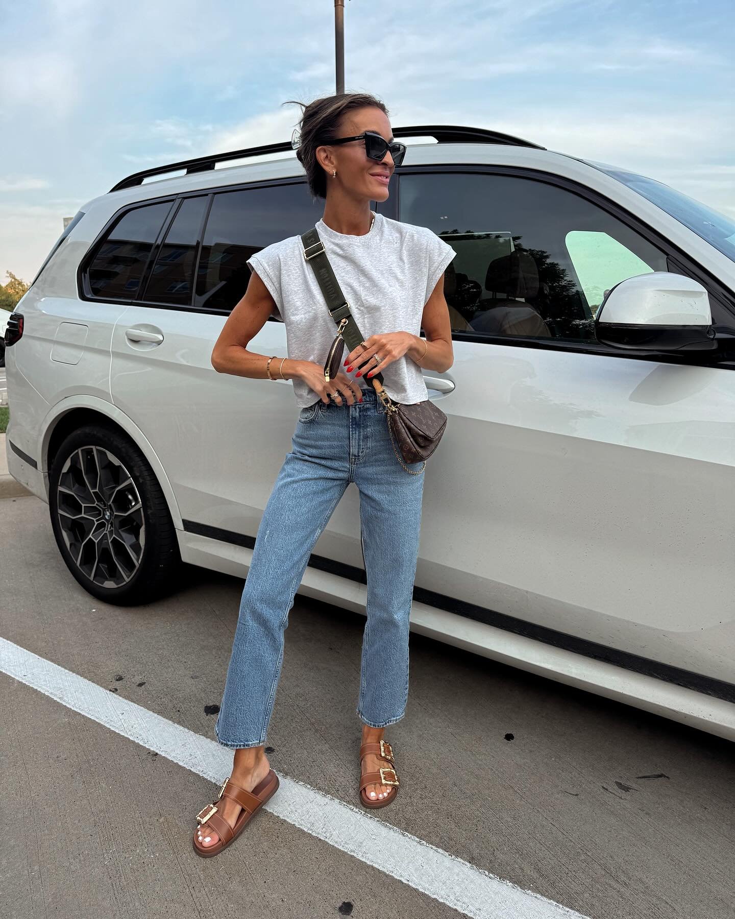 Grey Muscle Tee with Cropped Denim and Double-Buckle Sandals
