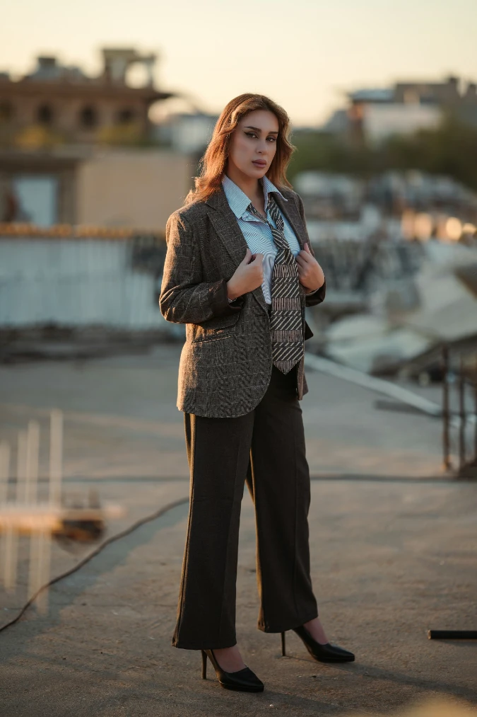 Grey Plaid Blazer with Striped Tie and Tailored Office Trousers in Golden Light