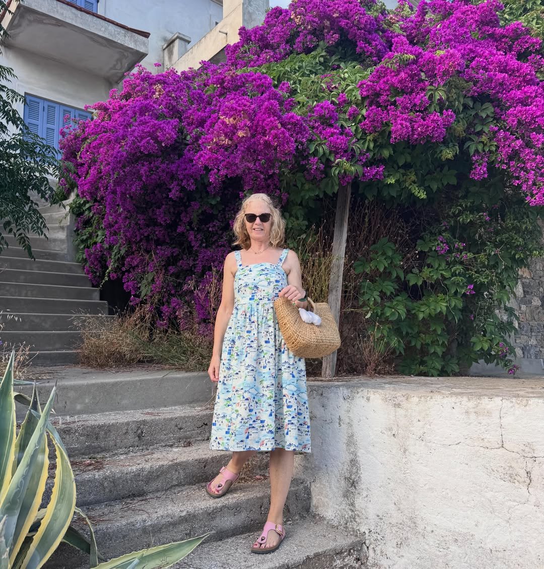 Illustrated Landscape Print Midi Dress with Pink Sandals and a Straw Basket Bag