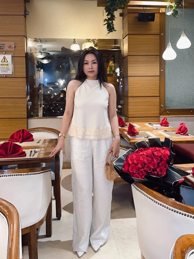 Ivory Halter Top and White Wide Leg Pants for a Soft Anniversary Dinner Look