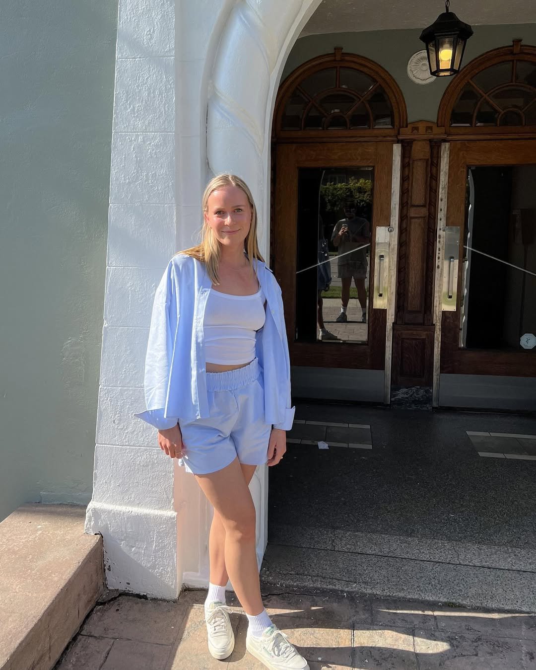 Light Blue Poplin Button-Down Set with a White Crop Top and Sneakers