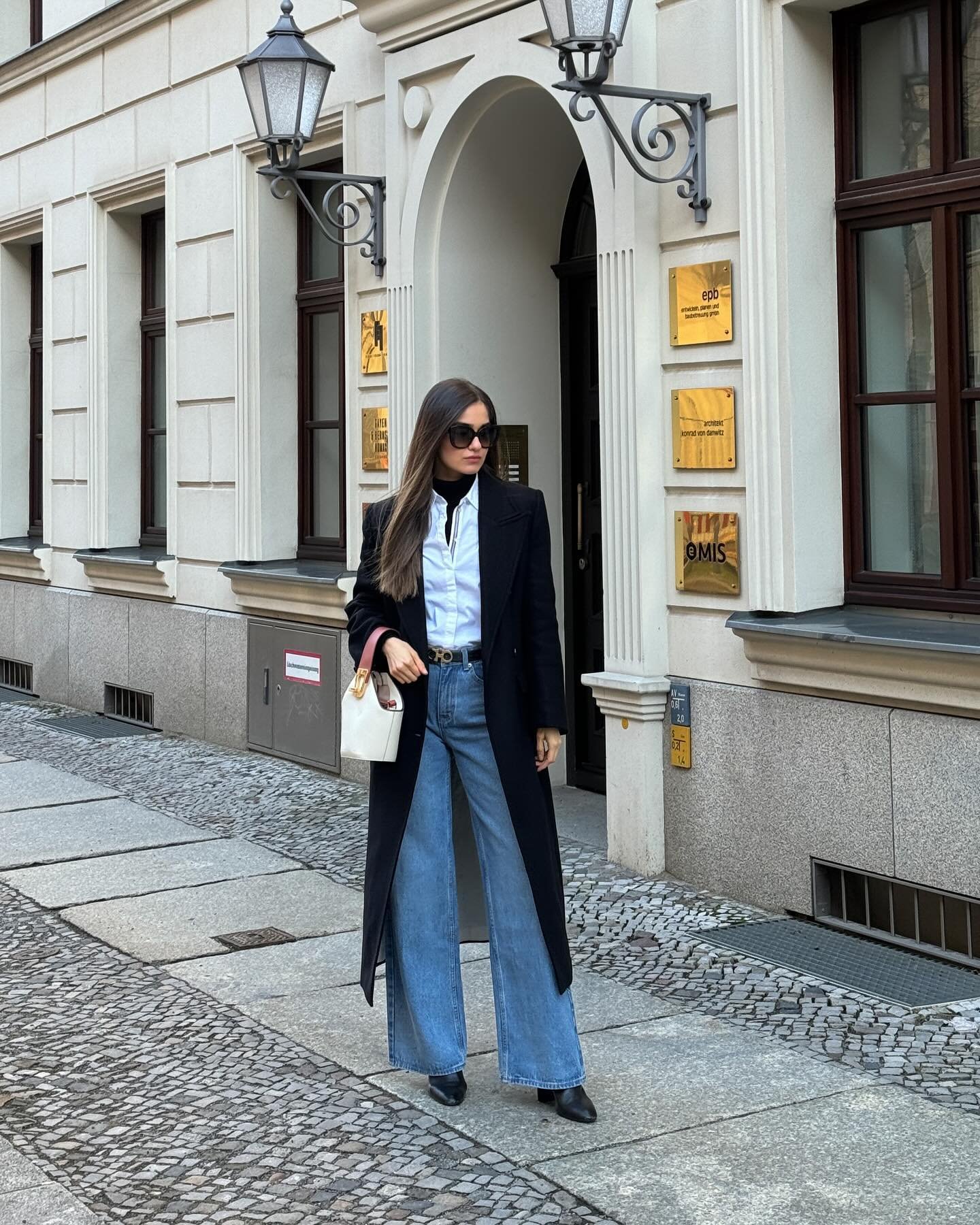 Mid-Wash Wide-Leg Jeans with Layered Button-Down and Long Tailored Coat
