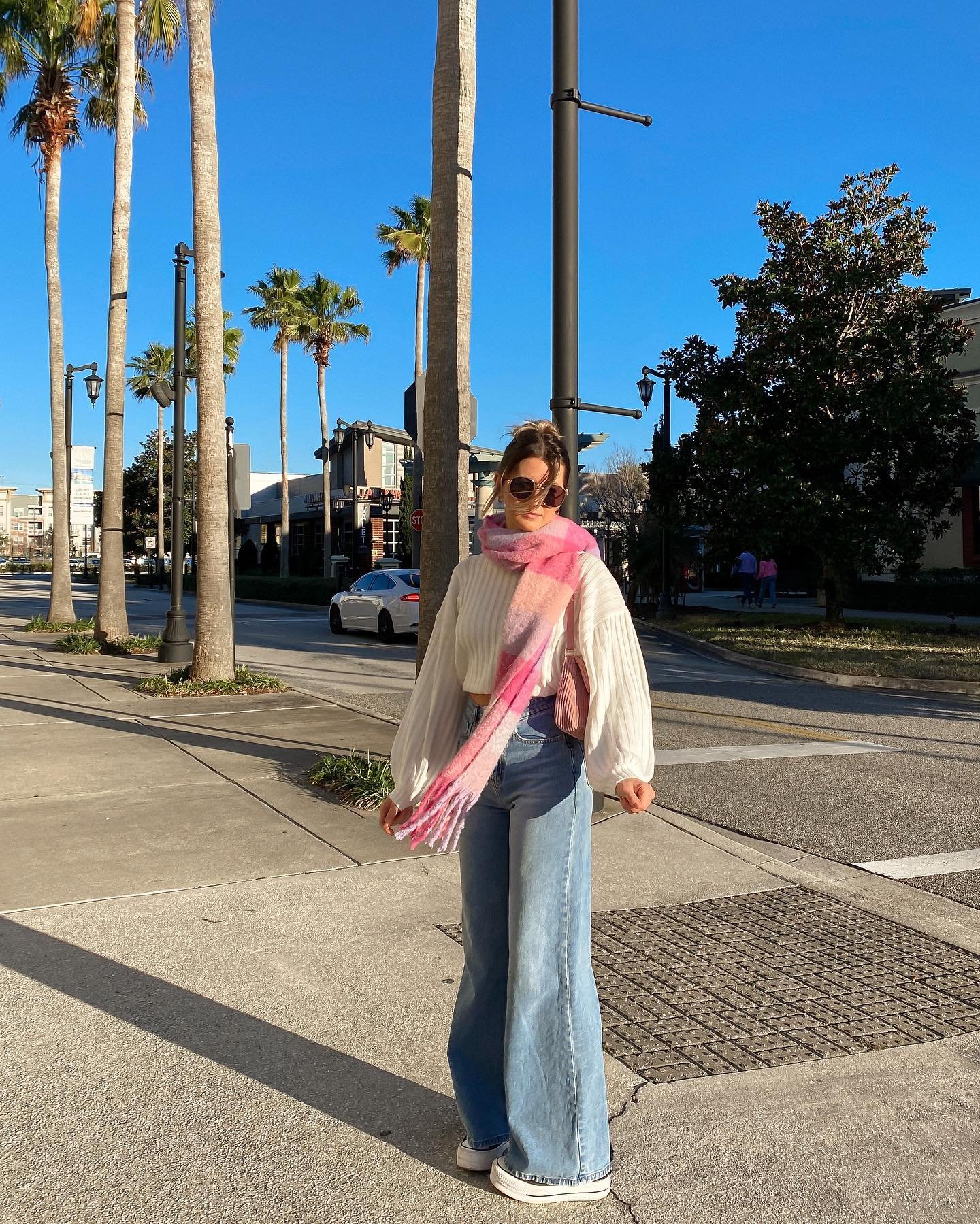 Mid-Wash Wide-Leg Jeans with Ribbed Blouse and Chunky Pink Scarf