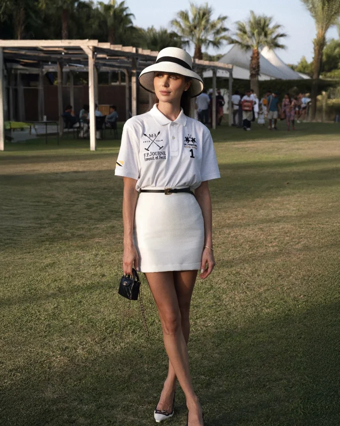  Monochrome Polo Shirt with Mini Skirt and Belted Structure on Club Lawn