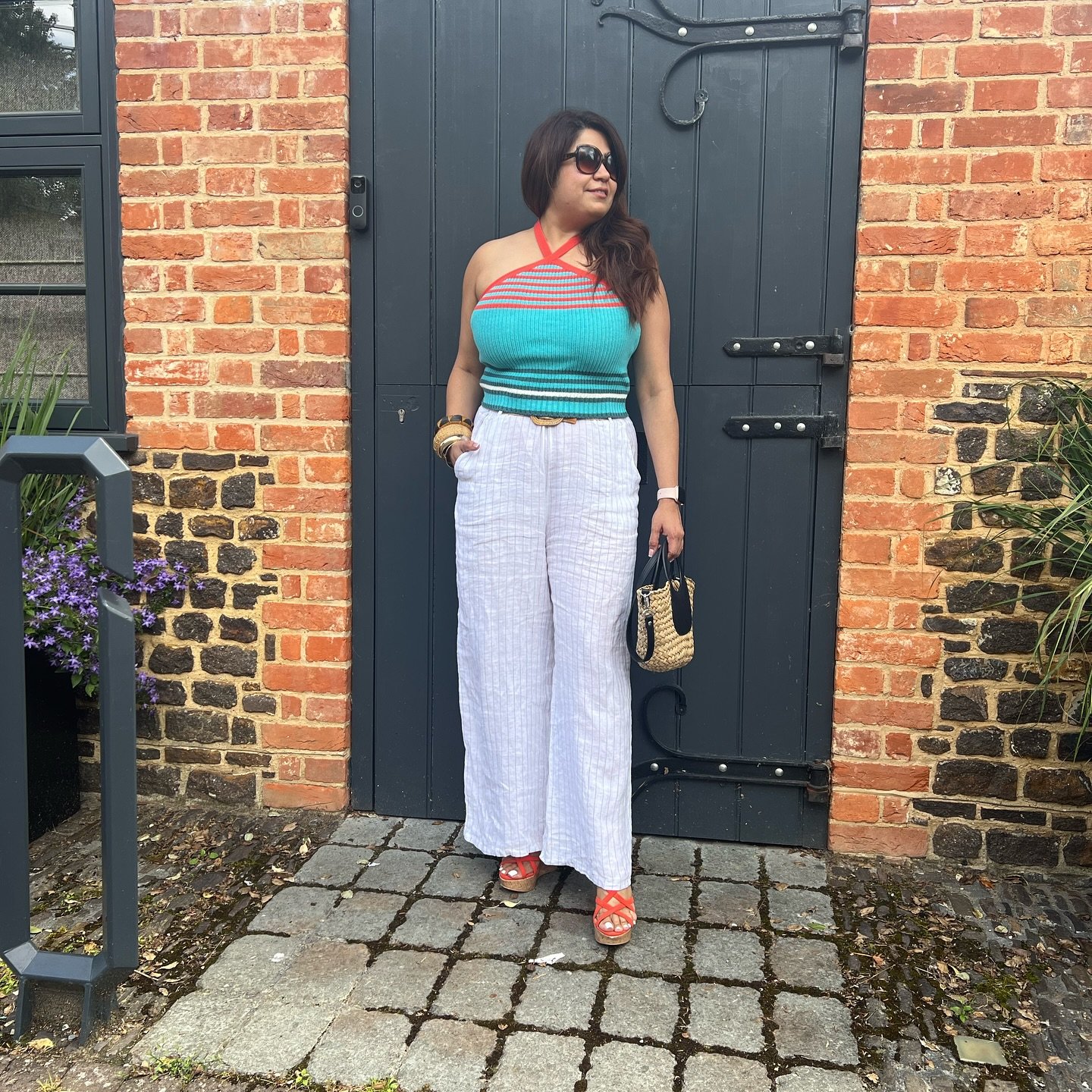 Multi-Colored Halter Top with White Linen Wide-Leg Trousers