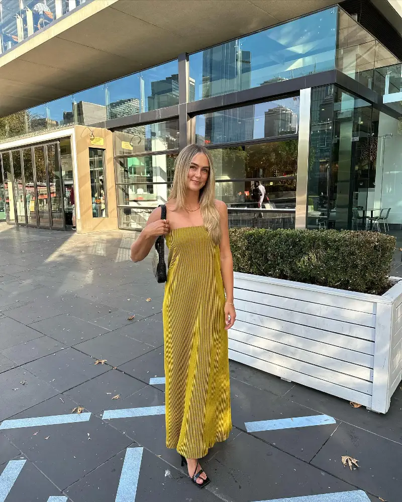 Mustard Pleated Strapless Maxi Dress with Minimal Accessories in Urban Daylight