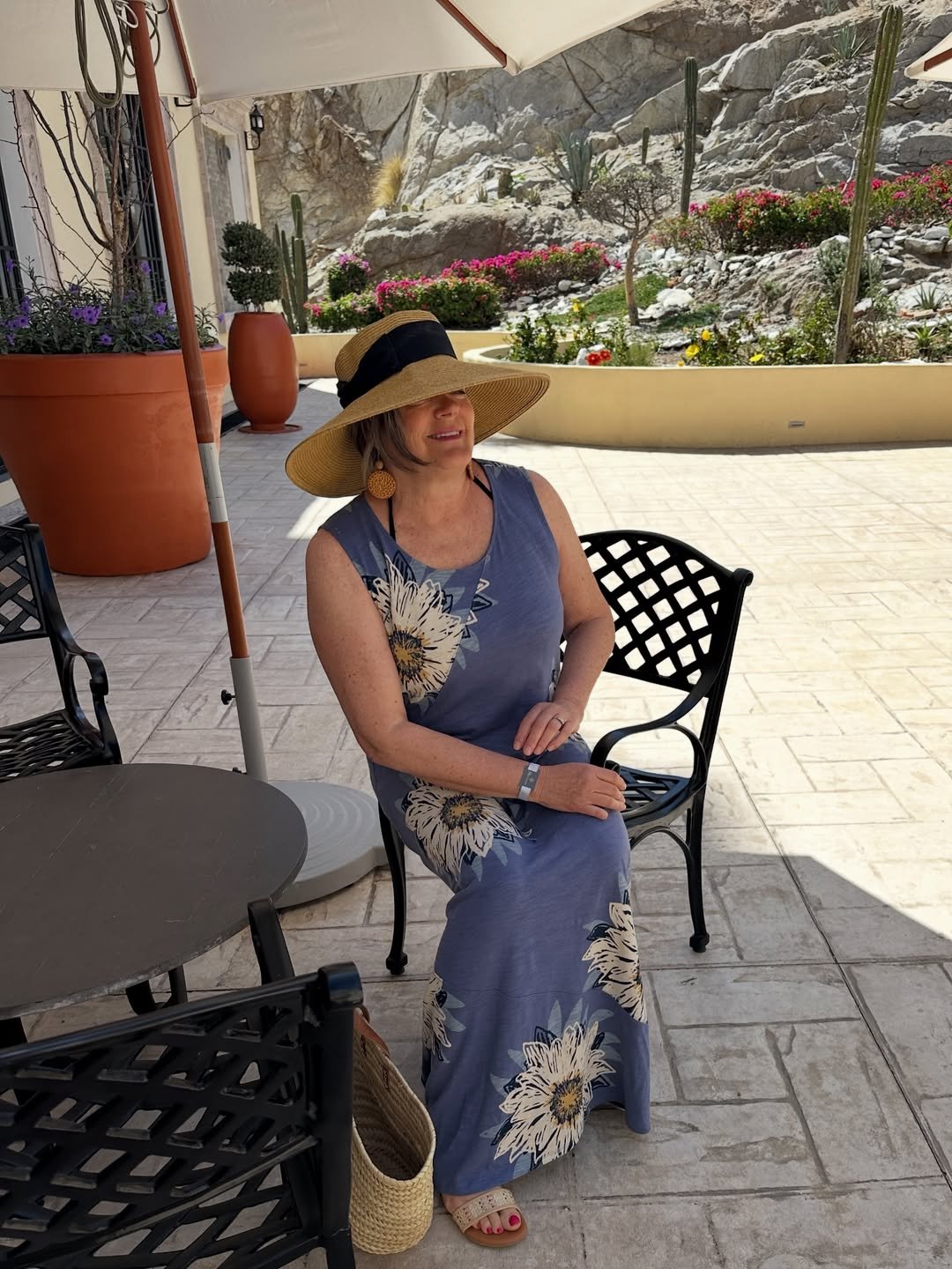 Muted Blue Floral Knit Maxi Dress with an Oversized Woven Straw Sun Hat