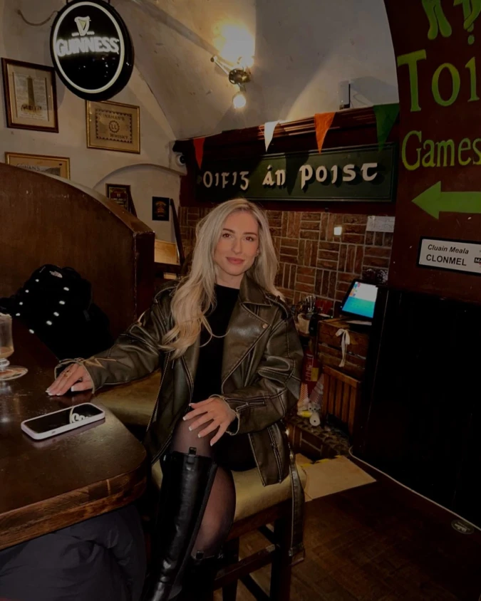 Olive Leather Biker Jacket with Black Mini Dress and Knee Boots