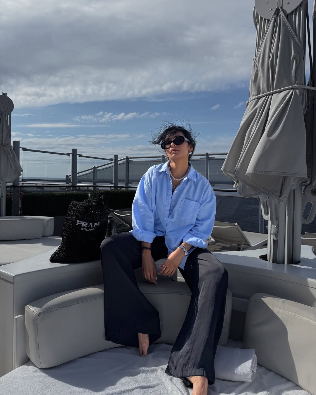Oversized Blue Button-Down with Fluid Black Trousers and Woven Tote