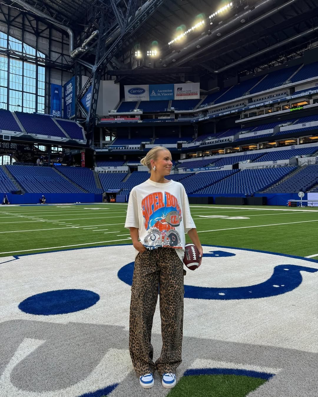 Oversized Graphic Tee, Bold Leopard Cargoes, and Blue Sneakers Game Day Casual Streetwear