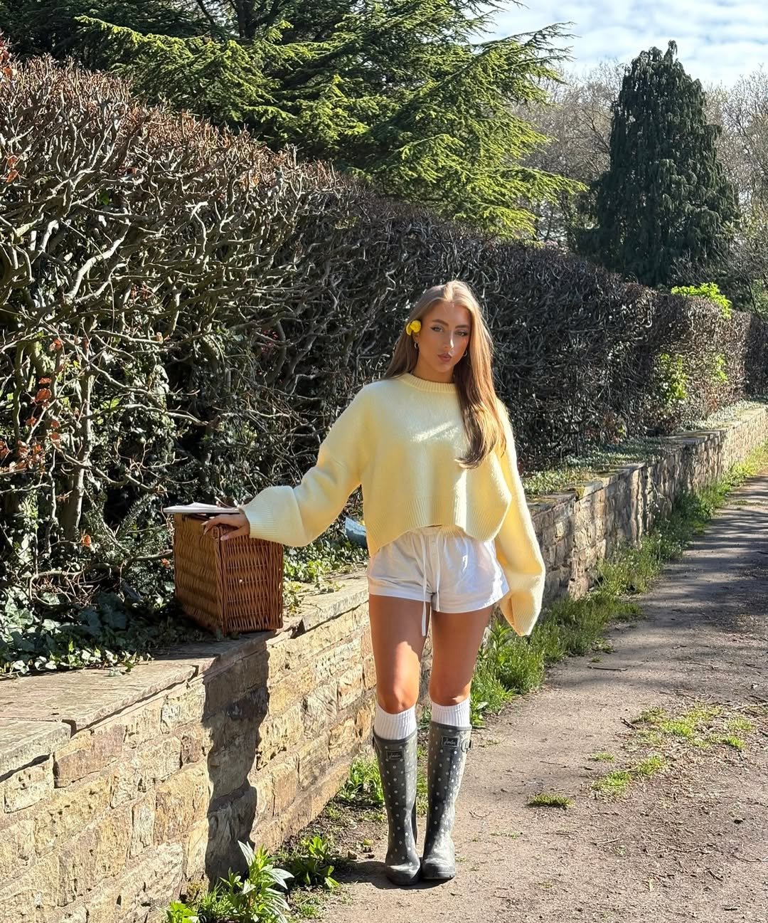 Oversized Yellow Knit Sweater with White Lounge Shorts and Polka Dot Rain Boots