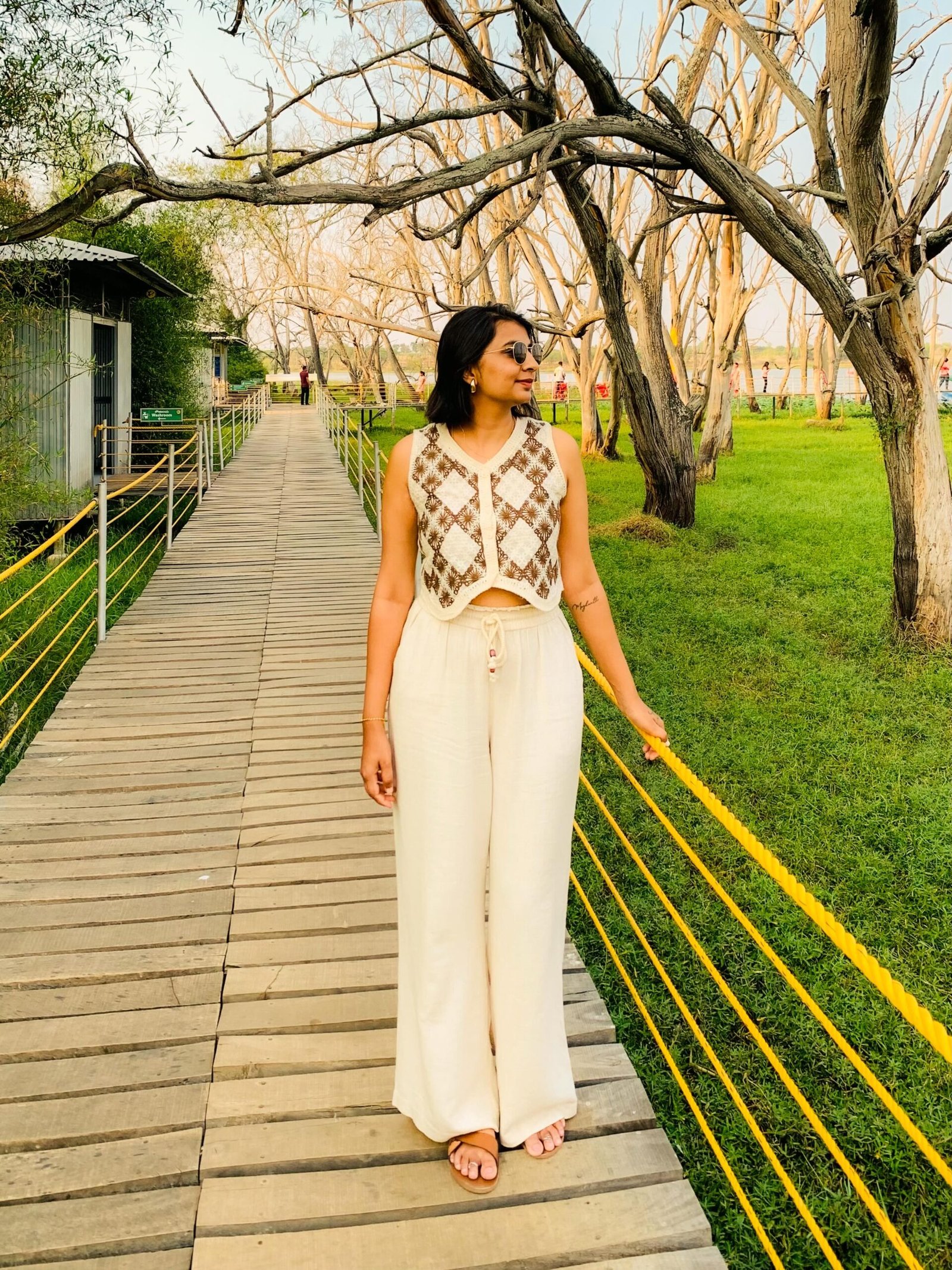Patterned Crochet Vest with Cream Wide-Leg Linen Trousers