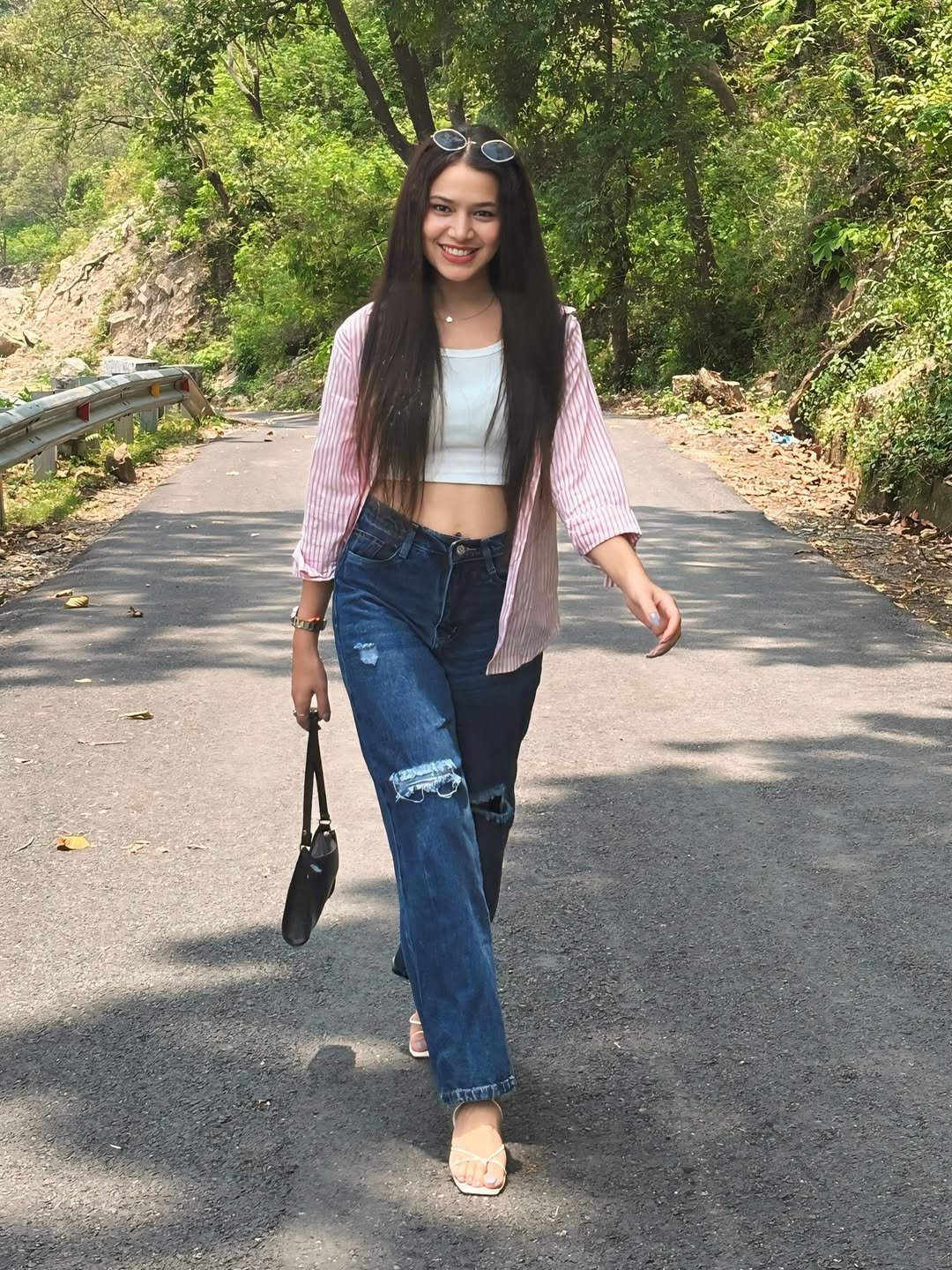 Pink Striped Overshirt with White Crop Top and Distressed Denim