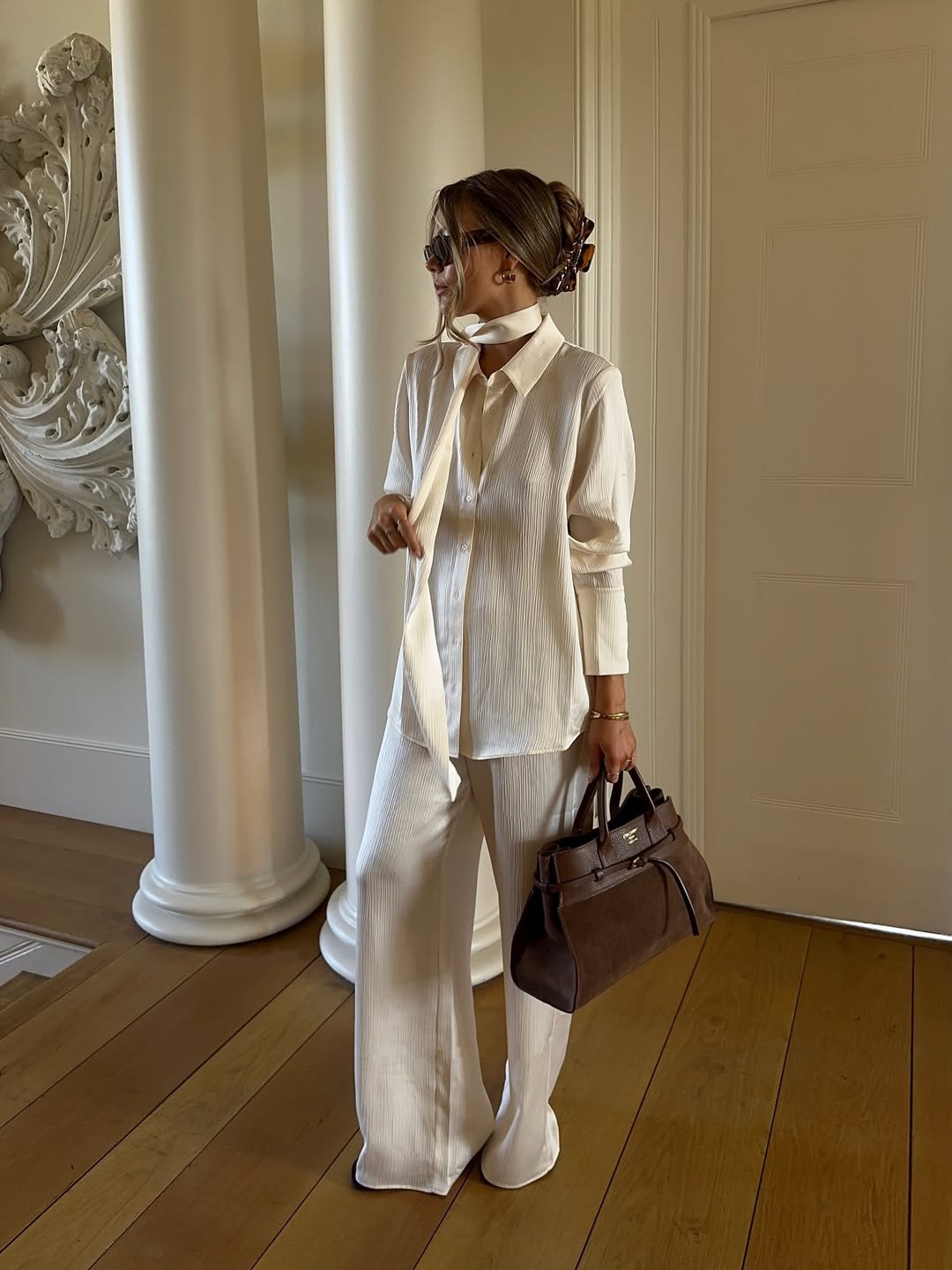 Pleated Cream Button-Down Shirt and Wide-Leg Trousers with Suede Tote Bag
