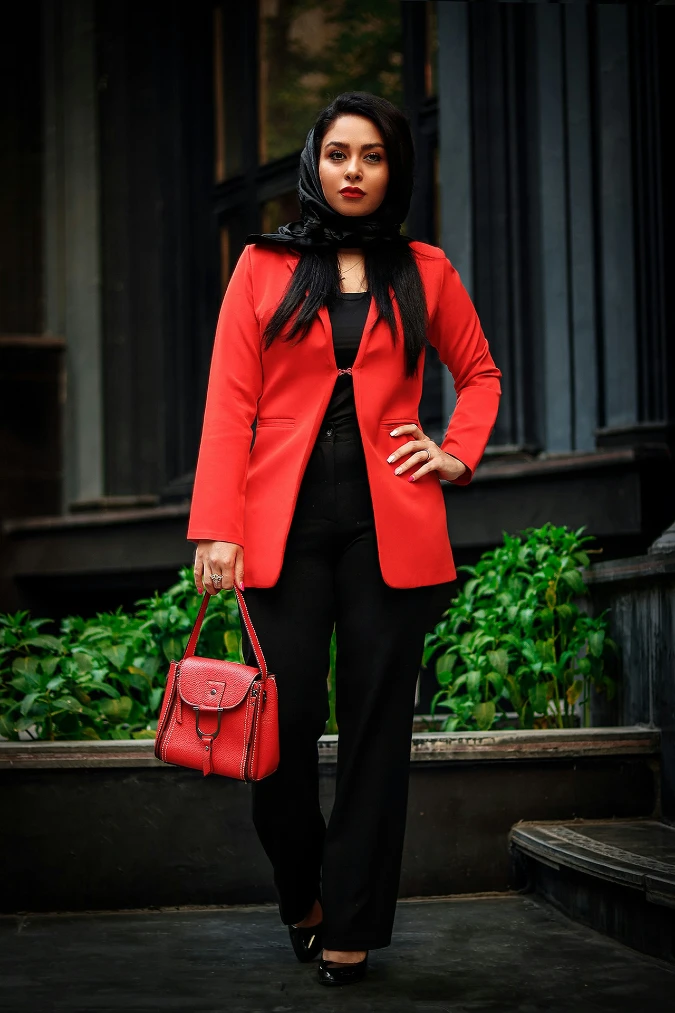  Red Blazer with Black Monochrome Base and Structured Handbag Accent