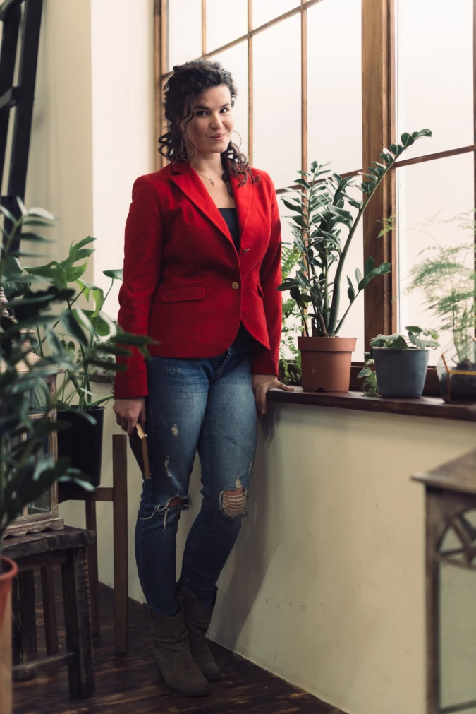 Red Blazer with Ripped Denim and Black Boots in Creative Office Light