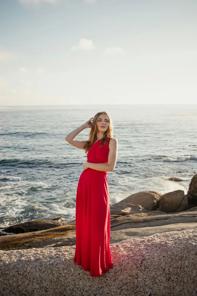 Red One Shoulder Maxi Dress on Ocean Rocks